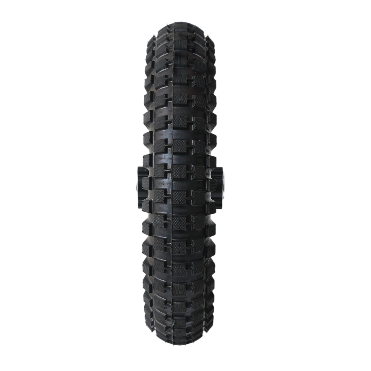 A black bicycle tire featuring a rugged tread pattern designed for off-road cycling, displayed against a stark black background. The tire's sidewall shows detailed tread blocks and grooves, indicating durability and traction suitable for various terrains.