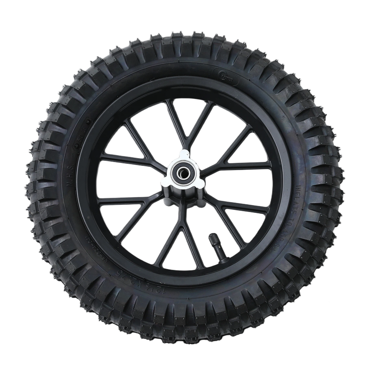 A black tire with rugged tread pattern mounted on a black wheel featuring multiple spokes and a silver hub cap. The tire has embossed lettering along the sidewall.